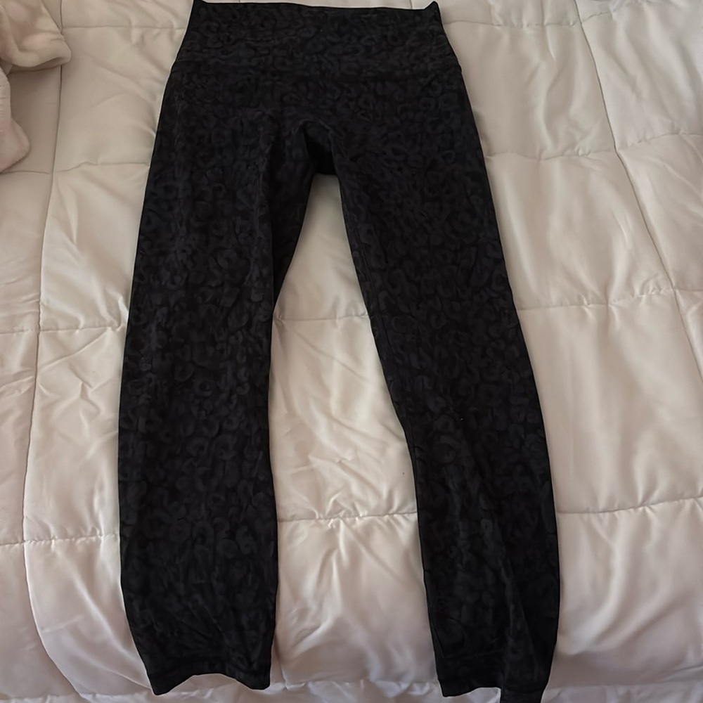 Lululemon cheetah print black leggings. Size 6. Good condition.